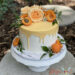 Drip Cake - Alles Marille mit ein paar apriko-farbenen Rosen verzieren den Drip Cake wobei der Drip ebenfalls eingefärbt wurde.
