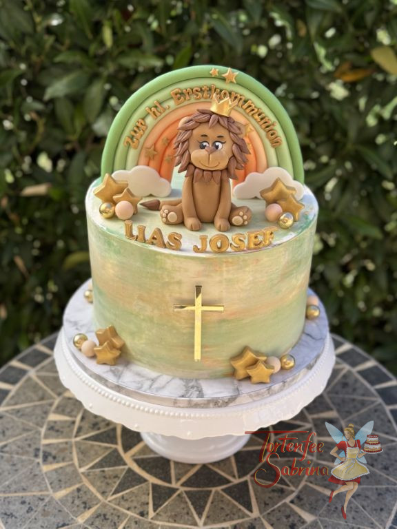 Erstkommunionstorte - Neugieriger Löwe schaut von der bunten Torte zum Regenbogen und sucht den Topf voll Gold.