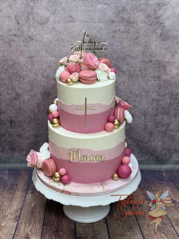 Erstkommunionstorte - Rosa Kugeln und auch Weisse verzieren die mehrfärbig eingestriche Torte mit goldenem Caketopper.