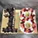 Geburtstagstorte Erwachsene - 2 färbiger 18er. Dieser Naked Cake in Form der 18 wurde mit Früchten und Süßigkeiten dekoriert.