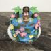 Geburtstagstorte Erwachsene - Aloha Hawaii, diese bunte Torte zeit Mama in mitten von Palmen, Meer und Blumenblüten.