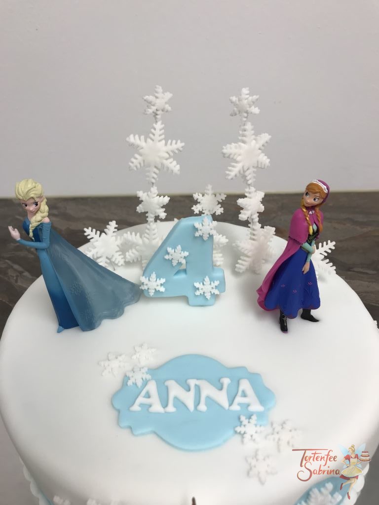 Geburtstagstorte Mädchen - Anna, Elsa und Olaf bei spielen in der Schneelandschaft mit Schneeflocken