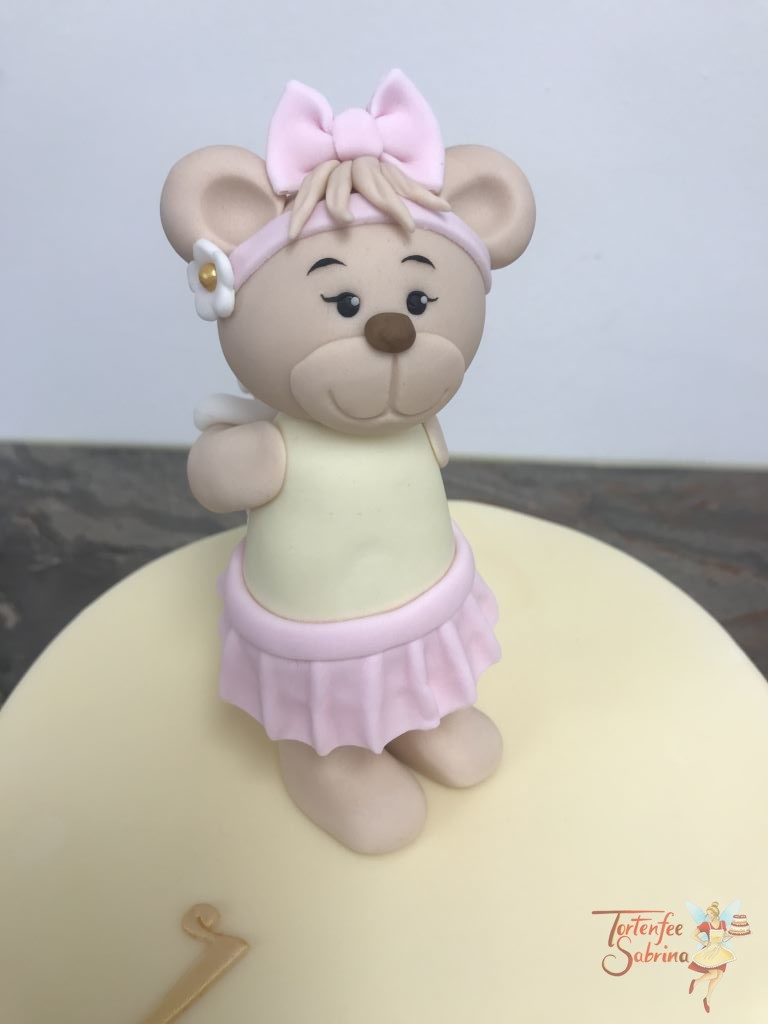 Geburtstagstorte Mädchen - Bär mit Häschen auf der Torte und neben der Torte umgekehr. Der Name ist vertieft und in goldener Farbe.