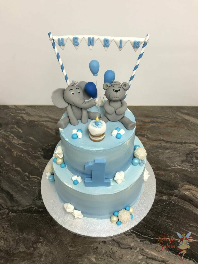 Geburtstagstorte Buben - Blaue Girlande darunter sitzen ein Elefant und ein Bär und freuen sich ebenfalls auf ihre Geburtstagstorte.