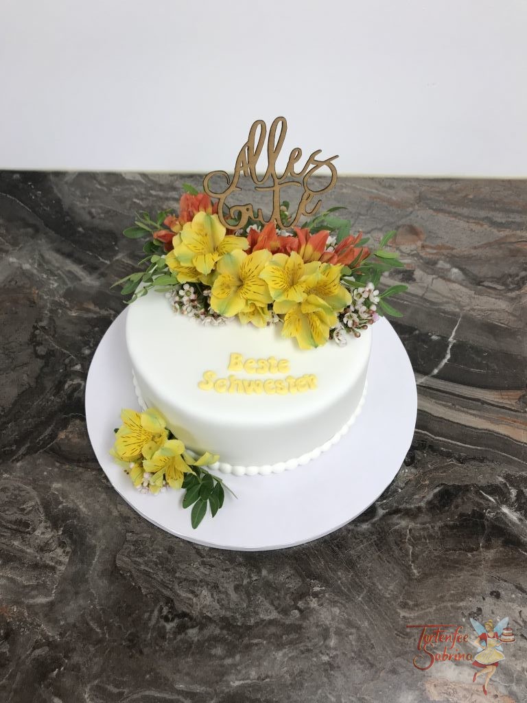 Geburtstagstorte Erwachsene - Bumenzauber ganz in gelb und orange, verziert mit echten Blumen und Cake Topper