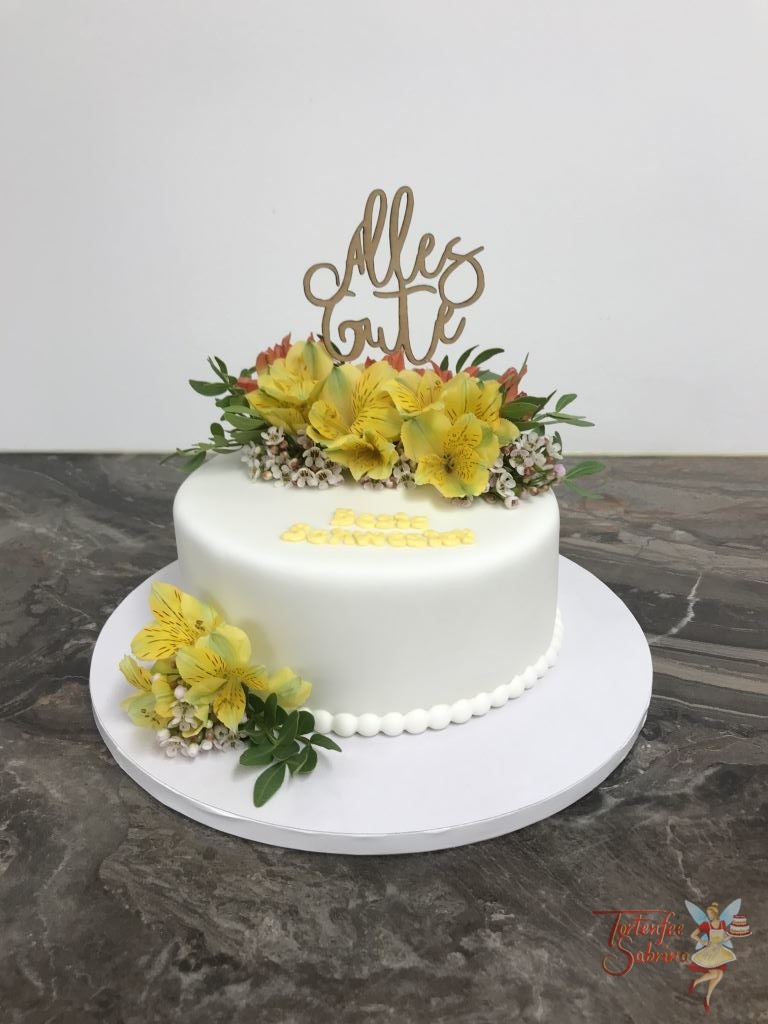 Geburtstagstorte Erwachsene - Bumenzauber ganz in gelb und orange, verziert mit echten Blumen und Cake Topper