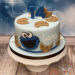 Geburtstagstorte Buben - Das Cookiemonster in blauer Farbe hat schon wieder jeden Keks auf der Torte angebissen.