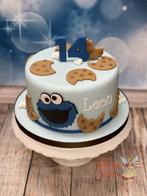 Geburtstagstorte Buben - Das Cookiemonster in blauer Farbe hat schon wieder jeden Keks auf der Torte angebissen.