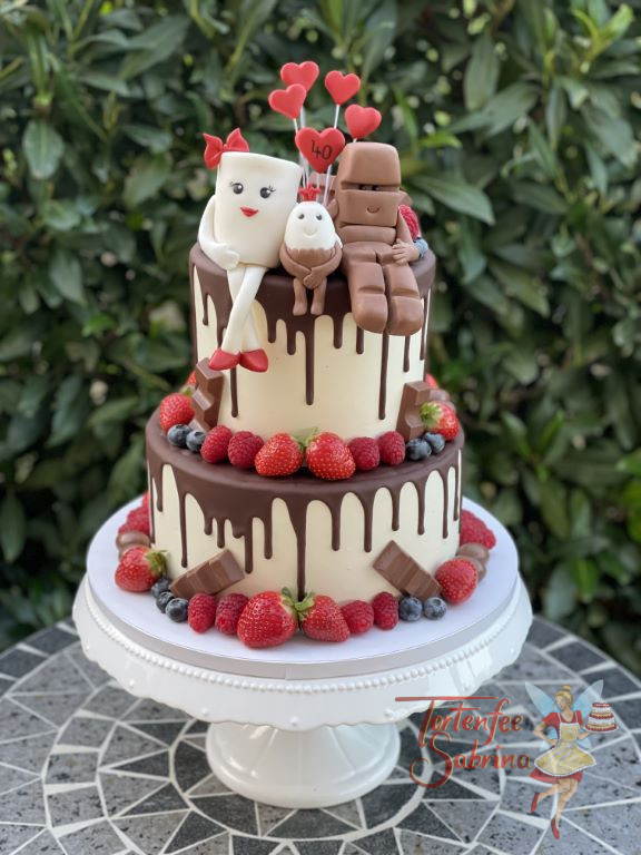 Geburtstagstorte Erwachsene - Das kleine Schokobon sitzt zwischen Milky und Schoki ganz oben auf dem Drip Cake.