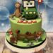 Geburtstagstorte - Der Affe mit dem Traktor sind oben auf der Torte, unten wartet der kleine Igel auf seine Freunde.