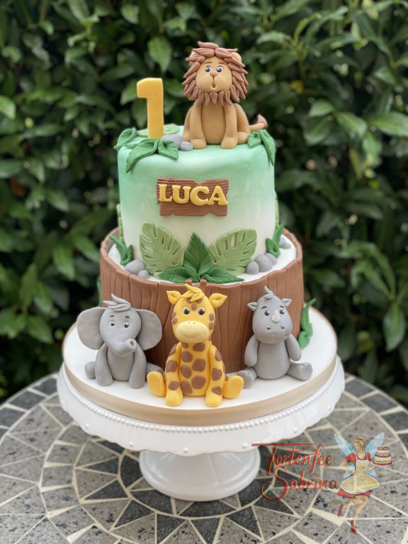Geburtstagstorte Buben - Der Löwe ruft zur Feier im Dschungel und seine Freunde der Elefant, die Giraffe und das Nashorn kommen.