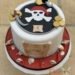 Geburtstagstorte Buben - Der Piratenschatz ist nur mittels der Schatzkarte zu finden. Oben auf der Torte liegen die ersten Goldstücke.