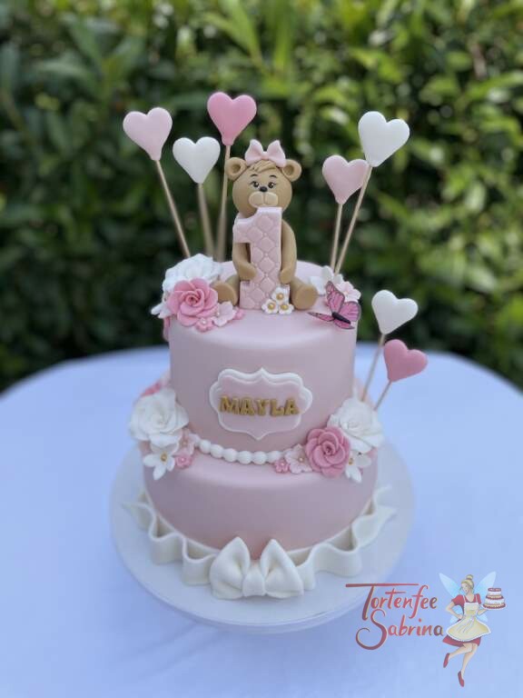 Geburtstagstorte Mädchen - Die 1 ganz groß mit einem süßen Bärchen, ebenfalls wurde die Torte mit Herzen und Rosen dekoriert.