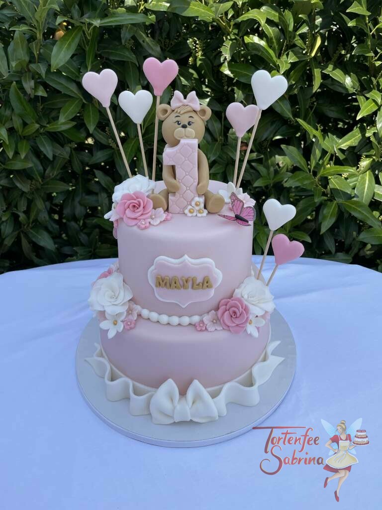 Geburtstagstorte Mädchen - Die 1 ganz groß mit einem süßen Bärchen, ebenfalls wurde die Torte mit Herzen und Rosen dekoriert.