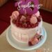 Geburtstagstorte Mädchen - Die Zehn in lila gibt es mit vielen verschiedenen Früchten und leckeren Süßigkeiten.
