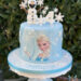 Geburtstagstorte Mädchen - Elsa lächelt Olaf an und freut sich über die vielen Schneeflocken auf der Torte.