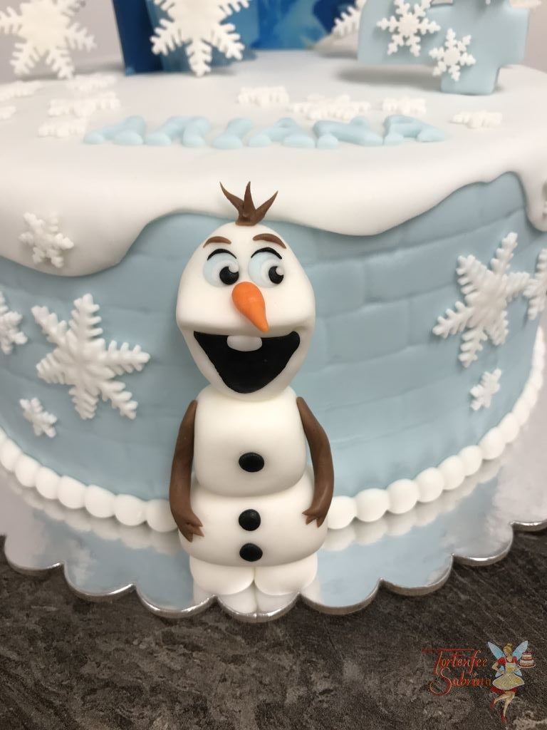 Geburtstagstorte Mädchen - Elsa´s Eispalast im Hintergrund, umgeben von vielen Schneeflocken, Elsa und Olaf.