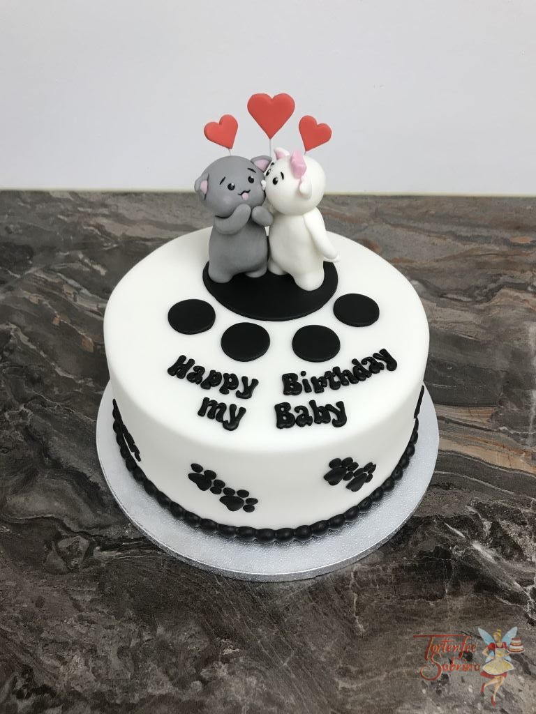 Geburtstagstorte - Emoticon in 3D. Zwei süße Kätzchen in weiß und grau geben sich ein Küsschen und dabei sprühen die Herzchen.