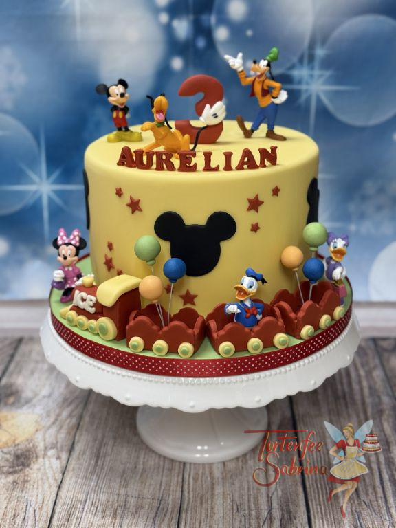 Geburtstagstorte Buben - Geburtstagszug besetzt mit den liebsten Disney-Charaktere ist unterweges einmal um die Torte.