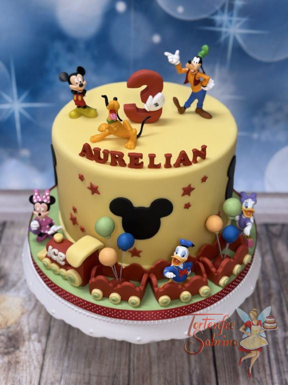Geburtstagstorte Buben - Geburtstagszug besetzt mit den liebsten Disney-Charaktere ist unterweges einmal um die Torte.