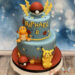 Geburtstagstorte Buben - Glumanda und Pikachu sind hier auf der zweistöckigen Torte, der untere Abschuß ist ein Flammenmuster.