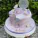 Geburtstagstorte Mädchen - Lila Schmetterlinge sitzen auf der Torte welche im Marble-Effekt eingedeckt wurde.
