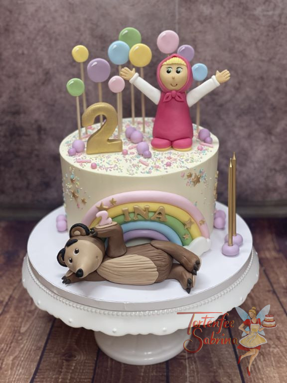 Geburtstagstorte Mädchen - Mascha und Bär Mischa verzieren die Torte, oben drauf sind viele Luftballons in verschiedenen Farben.