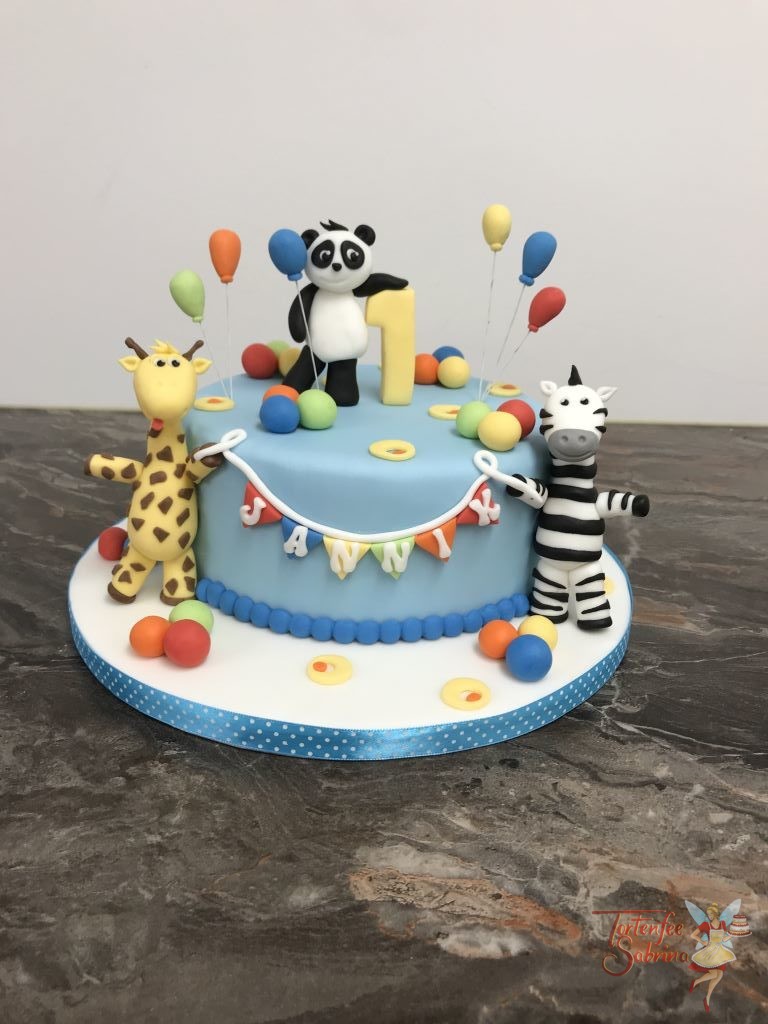 Geburtstagstorte Buben - Party mit Zootieren und vielen bunten Luftballons, mit auf der Torte sind eine Giraffe, ein Pandabär und ein Zebra.