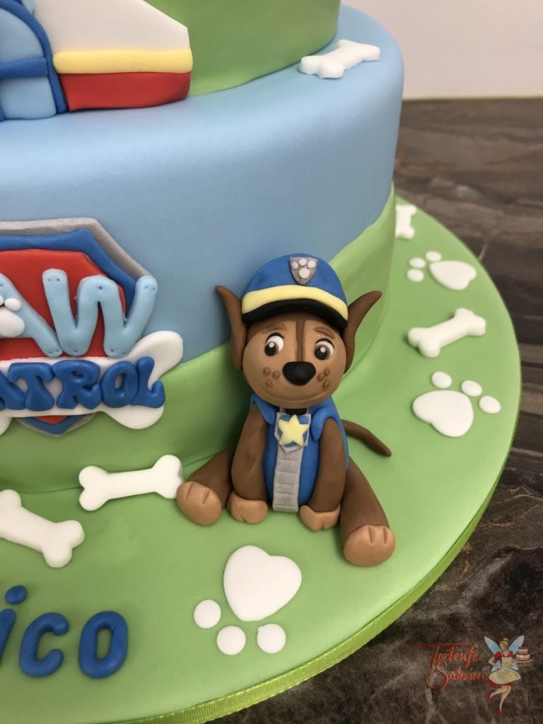 paw patrol tower drawn on a cake