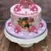 Geburtstagstorte Mädchen - Paw Patrol unterwegs dieses Mal in der Farbe rosa, verziert wurde die Torte mit Kugeln und Herzen.