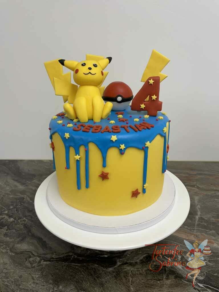 Geburtstagstorte Buben - Pokémon mit blauem Drip und Sternen in den Fraben rot und gelb. Mit auf der Torte Pikatchu und der Pokeball.