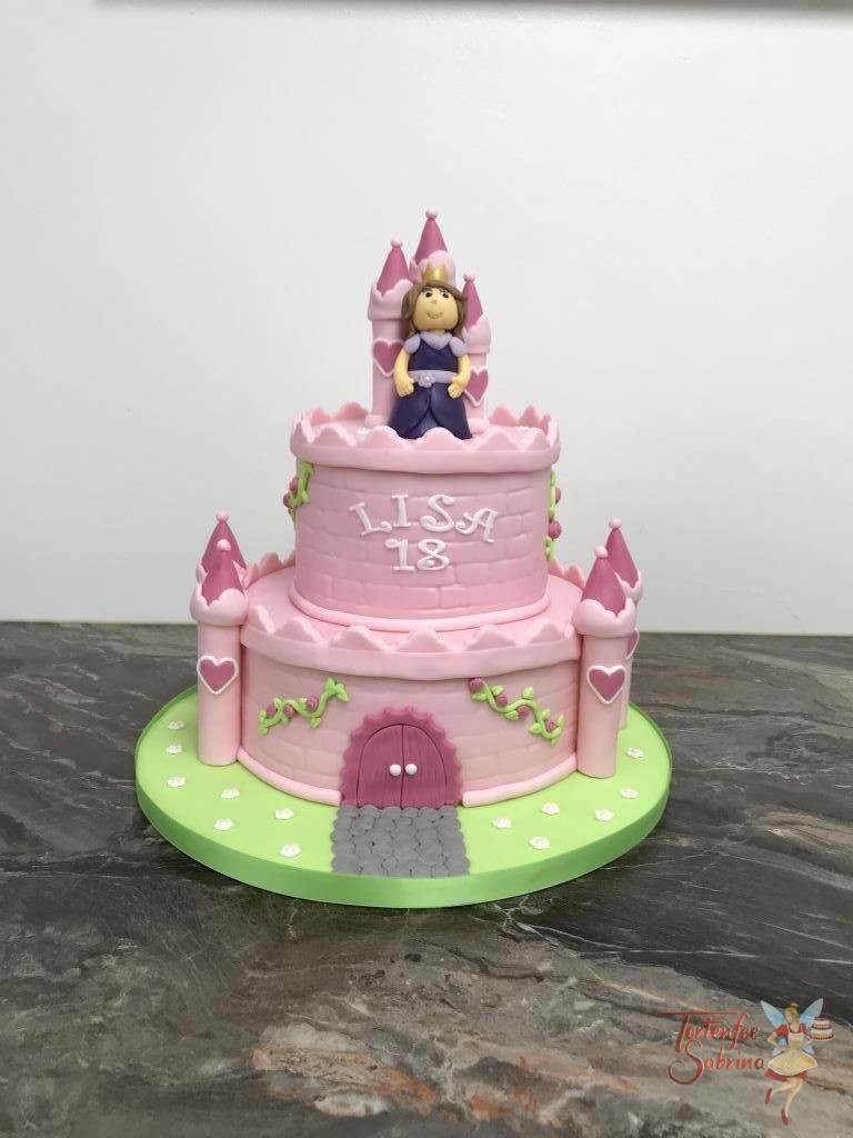 Geburtstagstorte Erwachsene - Prinzessin im rosa Schloß mit vielen Türmchen und Zinnen. Die glückliche Prinzessin mit lila Kleid und goldener Krone.