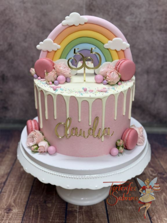 Geburtstagstorte Erwachsene - Regenbogen mit Rosen , rosa Macarons und weißem Drip verzieren die bunte Torte.