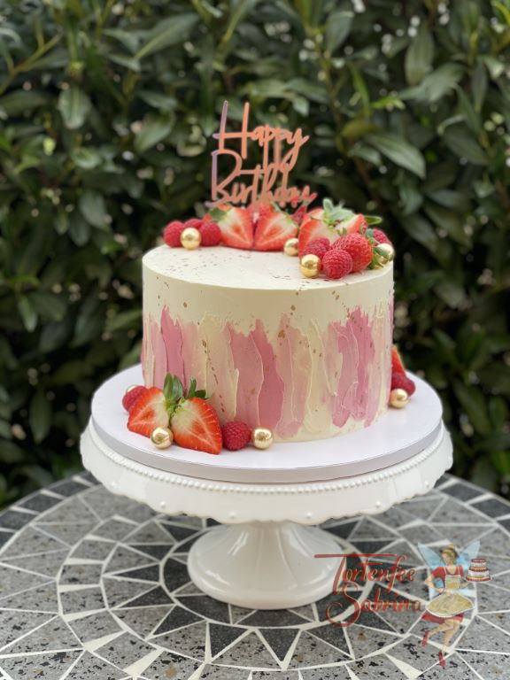 Geburtstagstorte Erwachsene - Rosa Farbekleckse wurden in verschiedenen Farbtönen seitlich angebracht und zieren die Torte.