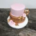 Geburtstagstorte Erwachsene - Rosa mit Kupfer, die 2-stöckige Torte wurde eingedeckt in den Farben rosa und kupfer, verziert mit 2-färbigen Rosen
