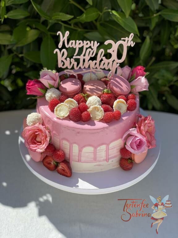 Geburtstagstorte Erwachsene - Rosa und süß mit Rosen auf einem schön, glänzenden rosa Drip.
