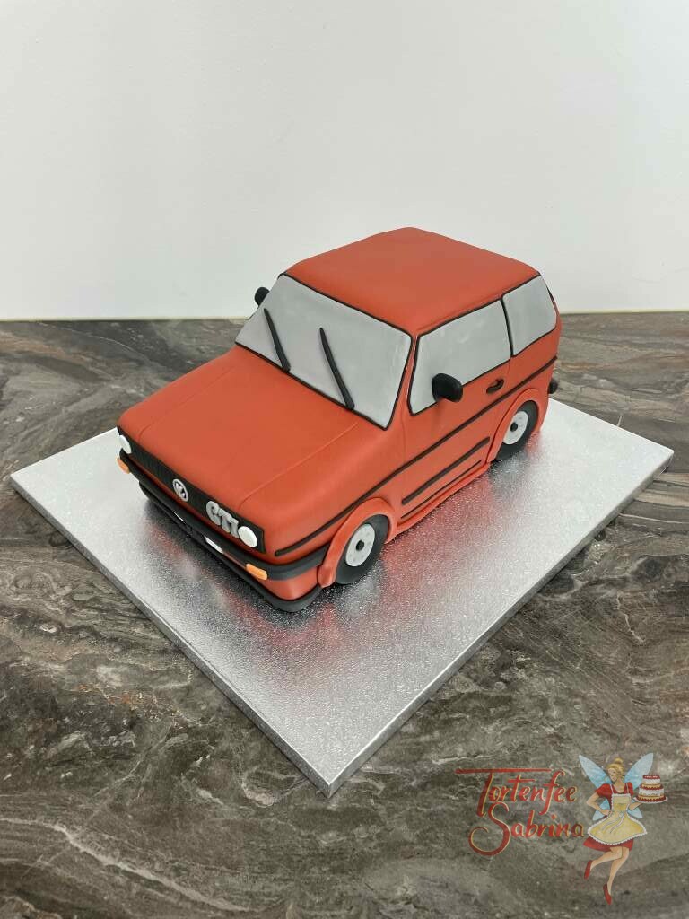 Geburtstagstorte Erwachsene - Schneller roter Golf GTI wurde hier in Form einer Torte verwirklicht mit vielen Details.