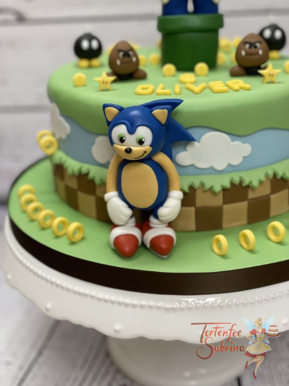 Geburtstagstorte Buben - Sonic und Super Mario sind gemeinsam auf der Torte, für jeden gibt es die passende Belohnung.