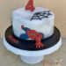 Geburtstagstorte Buben - Spiderman bewegt sich auf dich zu, die Torte wurde mit Spinnennetzen und der Vier verfeinert.