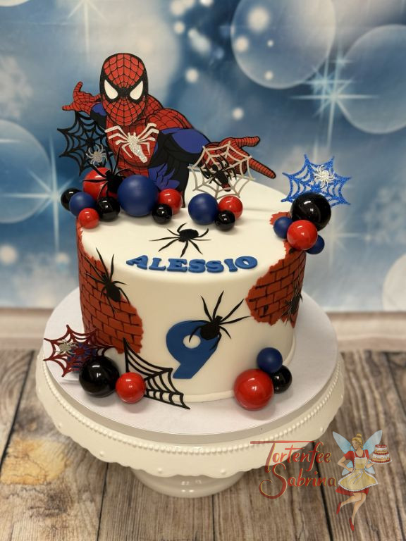 Geburtstagstorte Buben - Spidermans Netze fliegen in allen Farben durch die Luft, es sind auch noch ein paar kleine Spinnen zu sehen.