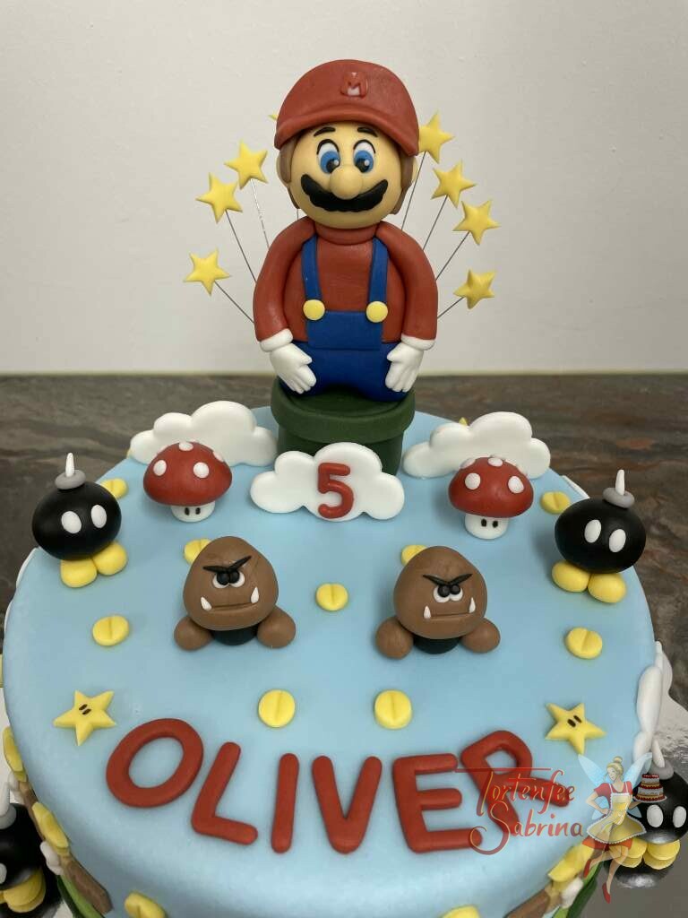 Geburtstagstorte Buben - Super Mario geht durch die Röhre in das nächste Level mit seinen kleinen Gegner und Münzen.