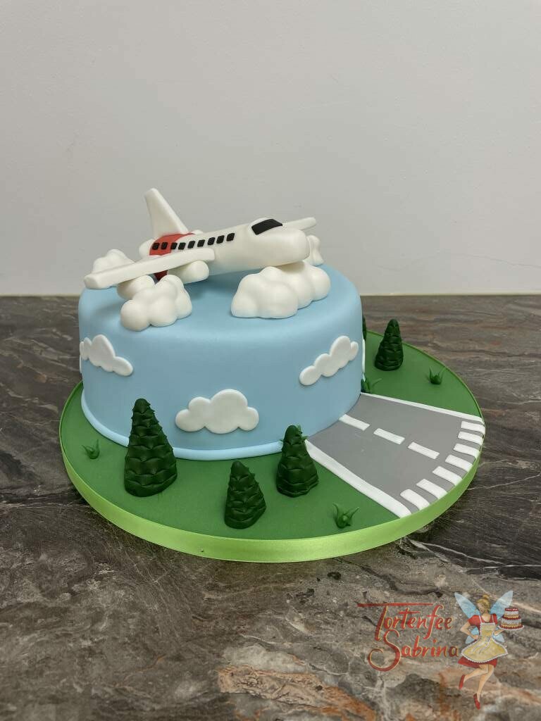 Geburtstagstorte Erwachsene - Über den Wolken muss die Freiheit woll grenzenlos sein, zeigt das Flugzeug beim Starten.