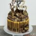 Geburtstagstorte Erwachsene - Vergoldete Schokolade mit Drip aus Gold befindet sich auf der Torte, ganz oben auf der Torte ist der Cake Topper.