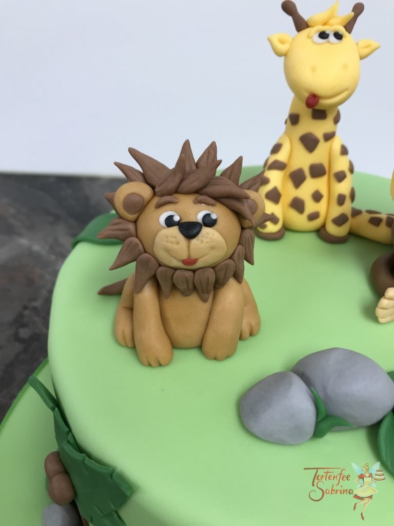 Geburtstagstorte Buben - Willkommen im Dschungel sagen die 3 Tiere, Löwe, Giraffe und Affe. Welcher ganz brav den 1ser hält.