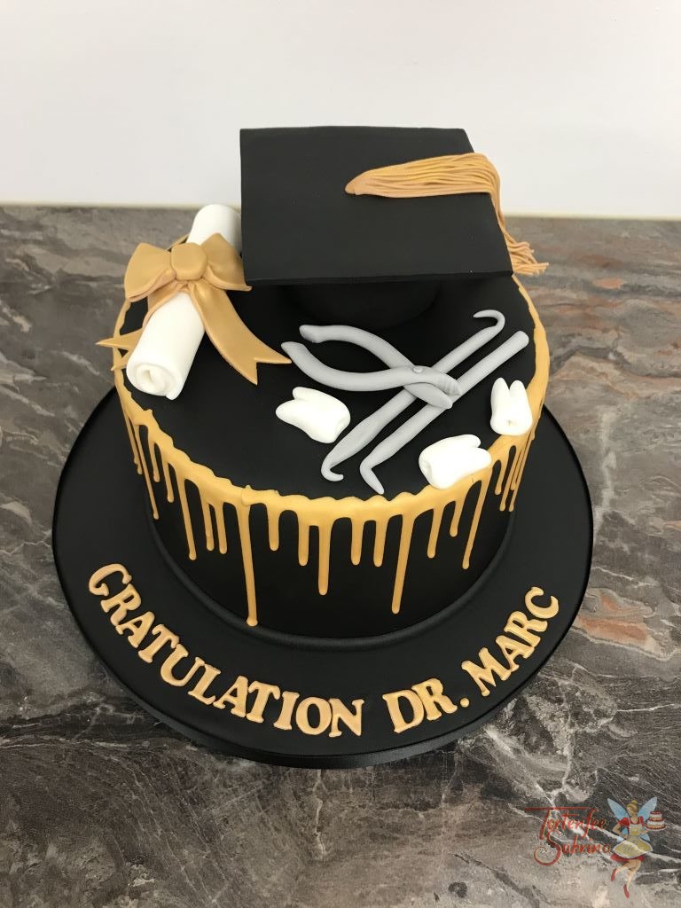 Geburtstagstorte Erwachsene - Zahnarzt mit Diplom. Schwarzer Drip Cake mit goldenem Drip, Urkunde und Hut.