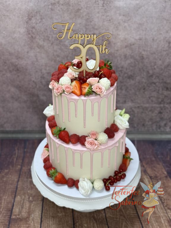 Geburtstagstorte Erwachsene - Zarter rosa Drip verziert die obere und untere Etage der fruchtig und süßen Torte.