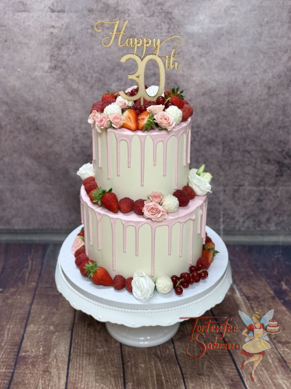 Geburtstagstorte Erwachsene - Zarter rosa Drip verziert die obere und untere Etage der fruchtig und süßen Torte.