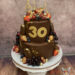 Geburtstagstorte Erwachsene - Zuckerschale gefüllt mit Beeren aller Art, die Torte wurde mit Cakesicles und Blattgold verfeinert.