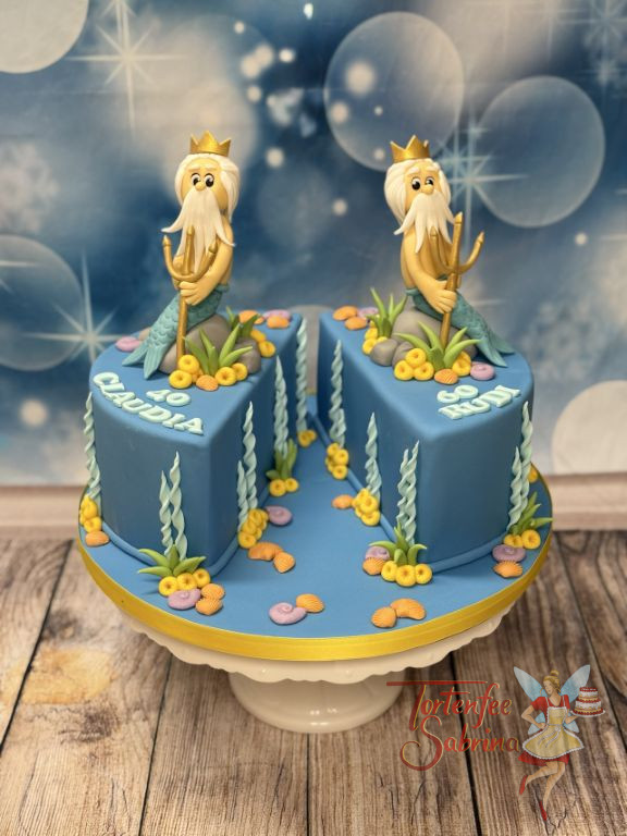 Geburtstagstorte Erwachsene - Zwei Wassermänner sitzten jeder für sich auf ihrer Hälfte der Torte und bewundern die Unterwasserwelt.