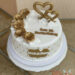 Hochzeitstagstorte - Goldene Herzen und Rosen zieren diese Torte, seitlich wurde ein Rautenmuster mit Perlen aufgebracht.